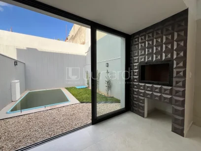 Foto Sobrado com 3 Dormitórios