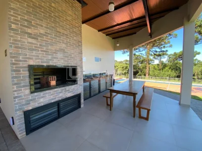 Foto Casa em Condomínio com 3 Dormitórios