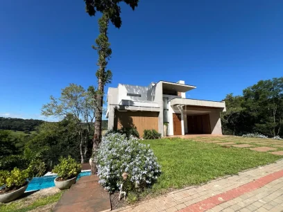 Foto Casa em Condomínio com 3 Dormitórios