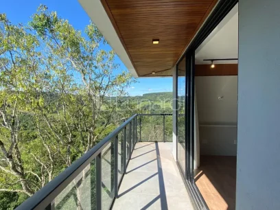 Foto Casa em Condomínio com 3 Dormitórios