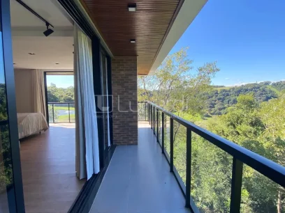 Foto Casa em Condomínio com 3 Dormitórios