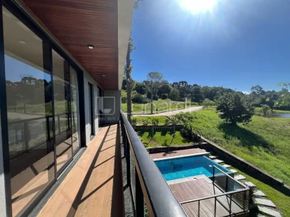 Foto Casa em Condomínio com 3 Dormitórios