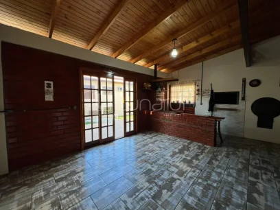 Foto Casa com 4 Dormitórios