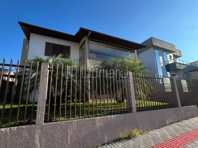 Foto Casa com 4 Dormitórios