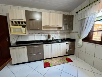 Foto Casa com 3 Dormitórios