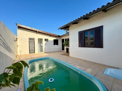 Foto Casa com 3 Dormitórios