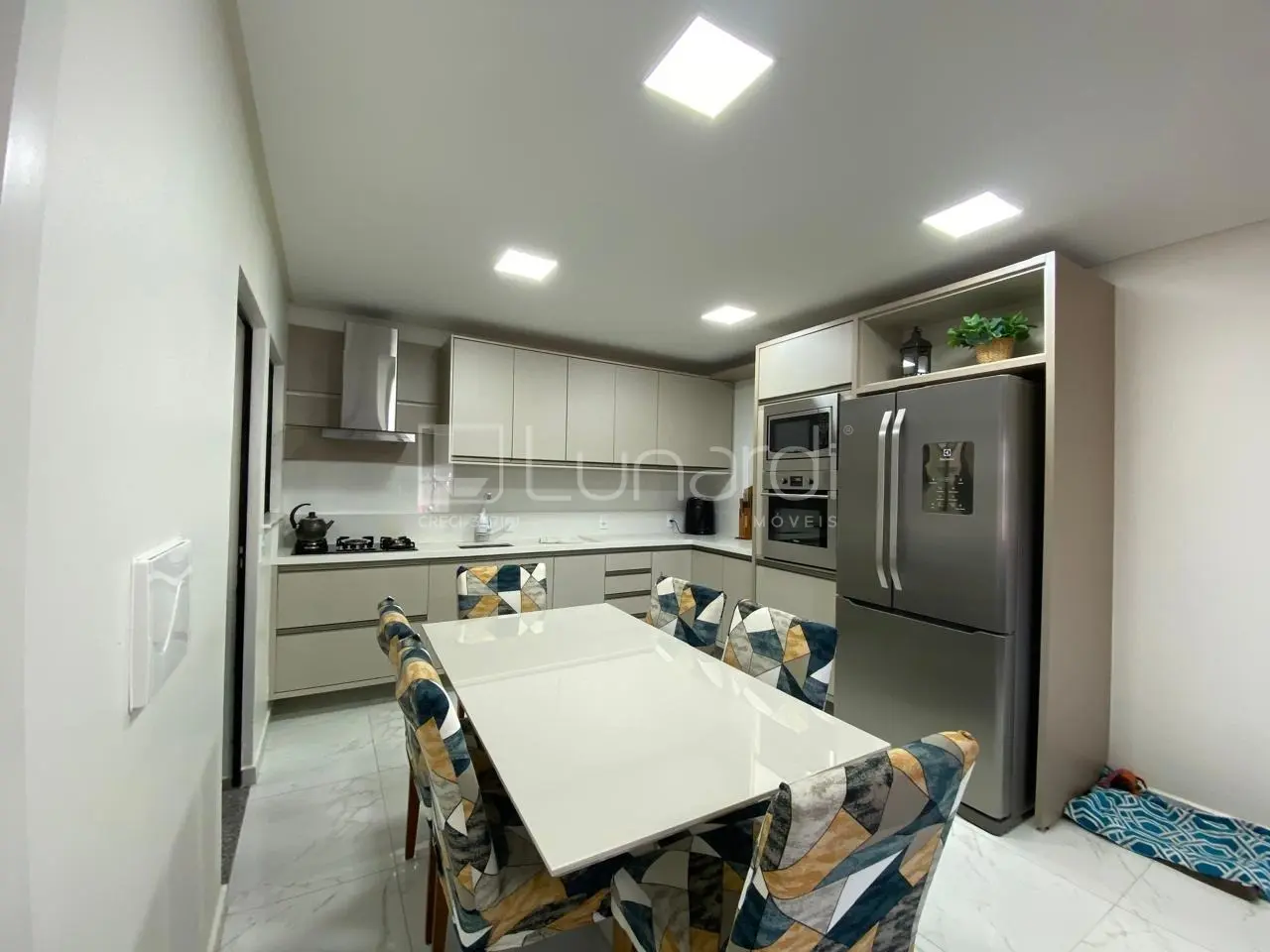 Foto Sobrado com 3 Dormitórios