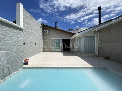 Foto Casa com 3 Dormitórios