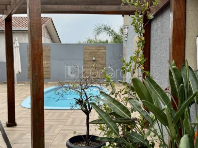 Foto Casa com 3 Dormitórios