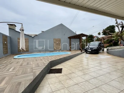 Foto Casa com 3 Dormitórios