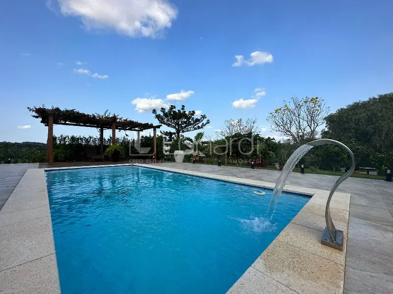 Foto Casa com 4 Dormitórios