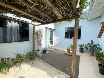 Foto Casa com 3 Dormitórios