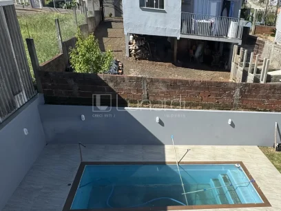 Foto Casa com 3 Dormitórios