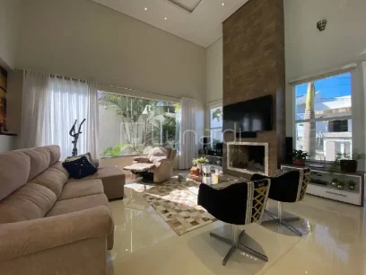 Foto Casa com 4 Dormitórios