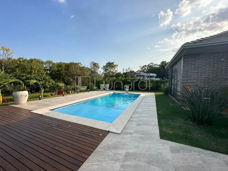 Foto Casa com 4 Dormitórios