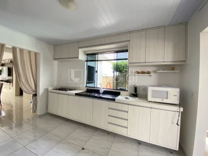 Foto Casa com 3 Dormitórios