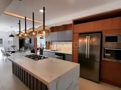 Foto Casa com 4 Dormitórios