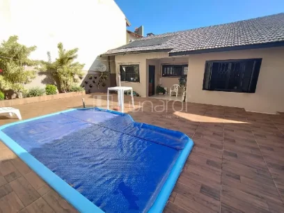 Foto Casa com 3 Dormitórios