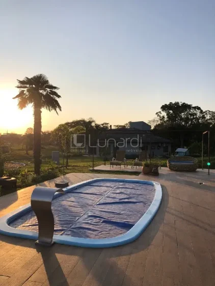 Casa com 4 Dormitórios - Lunardi Imóveis