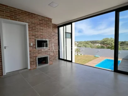 Foto Casa com 3 Dormitórios