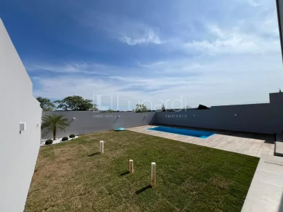 Foto Casa com 3 Dormitórios