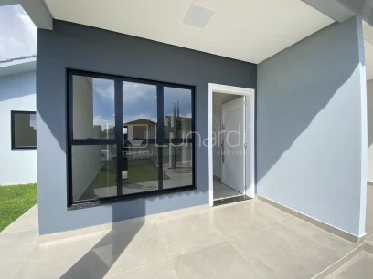 Foto Casa com 3 Dormitórios