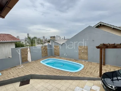 Foto Casa com 3 Dormitórios