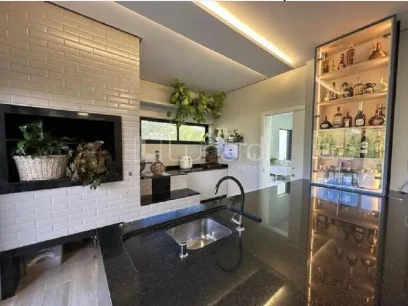 Foto Casa com 4 Dormitórios