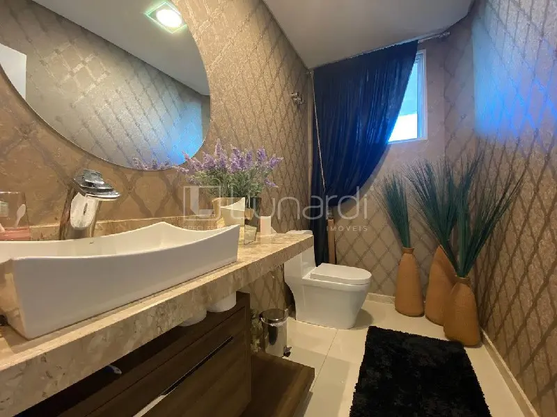 Foto Casa com 4 Dormitórios