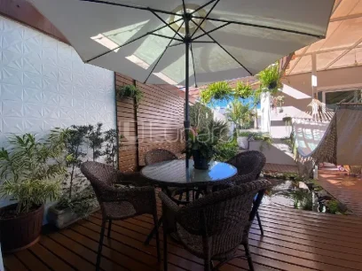 Foto Casa com 4 Dormitórios