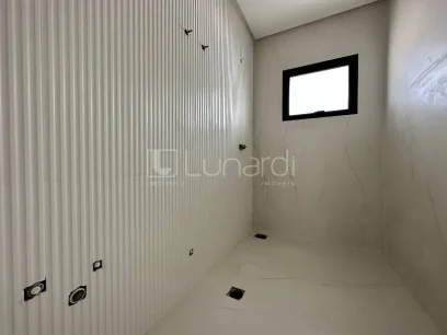 Foto Casa com 3 Suítes