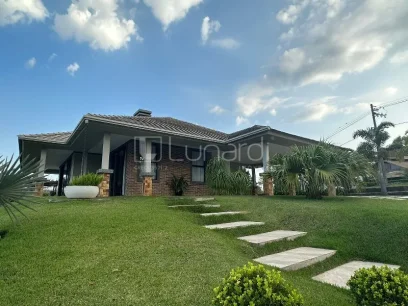 Foto Casa com 4 Dormitórios