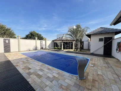 Foto Casa com 4 Dormitórios