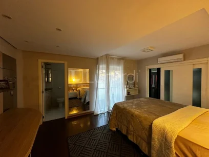 Foto Casa com 4 Dormitórios