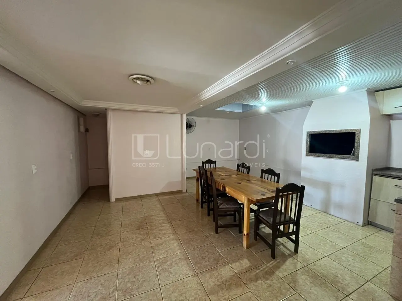 Foto Casa com 4 Dormitórios