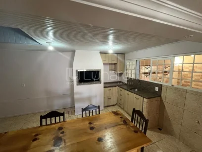Foto Casa com 4 Dormitórios
