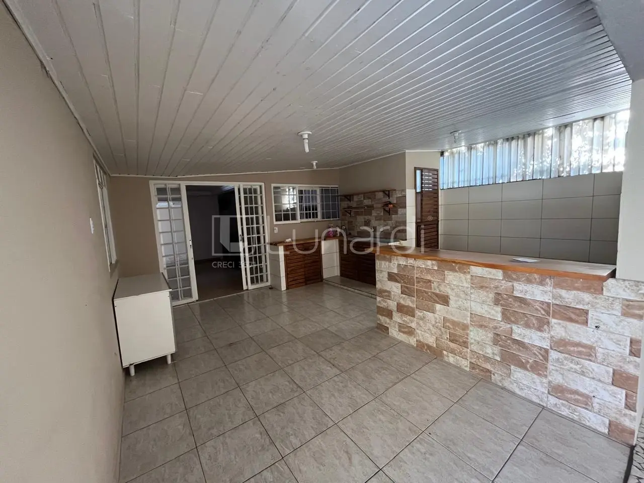 Foto Casa com 4 Dormitórios