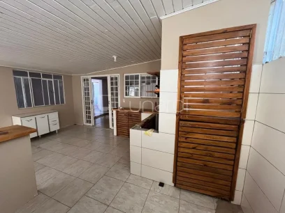 Foto Casa com 4 Dormitórios