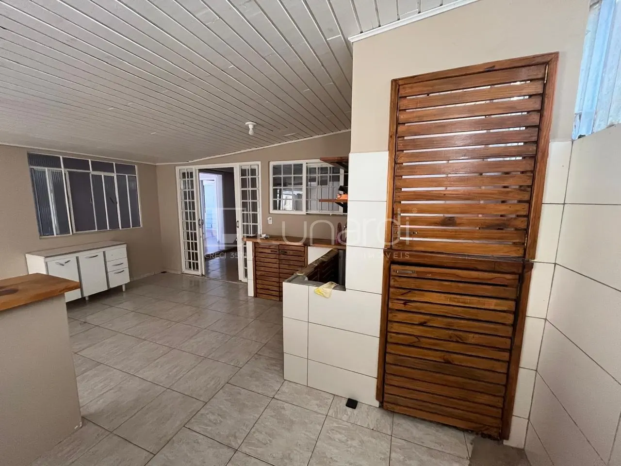 Foto Casa com 4 Dormitórios