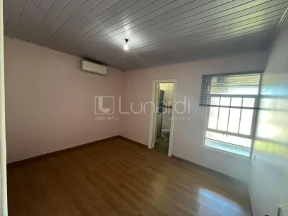 Foto Casa com 4 Dormitórios
