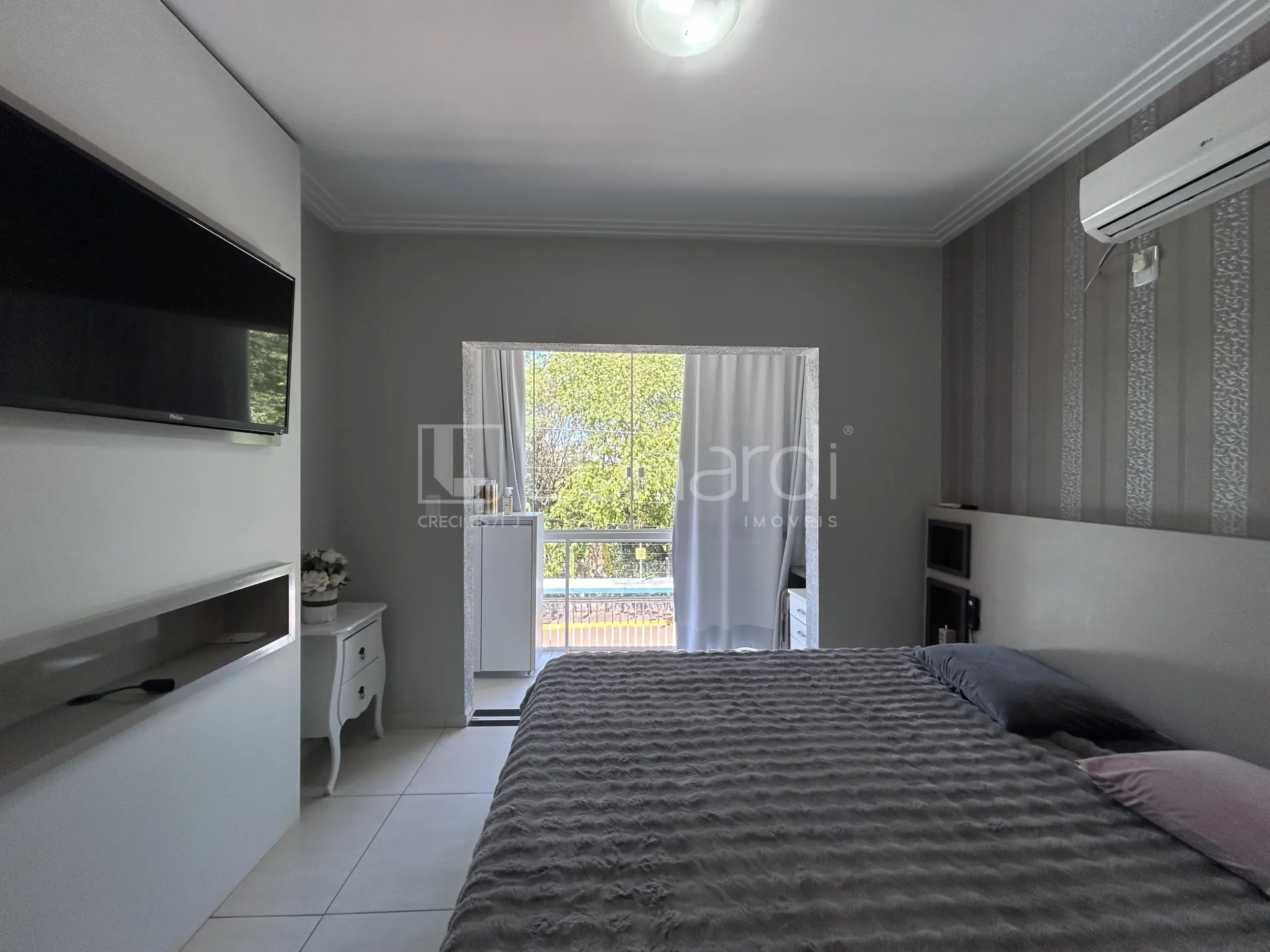 Foto Casa com 3 Dormitórios