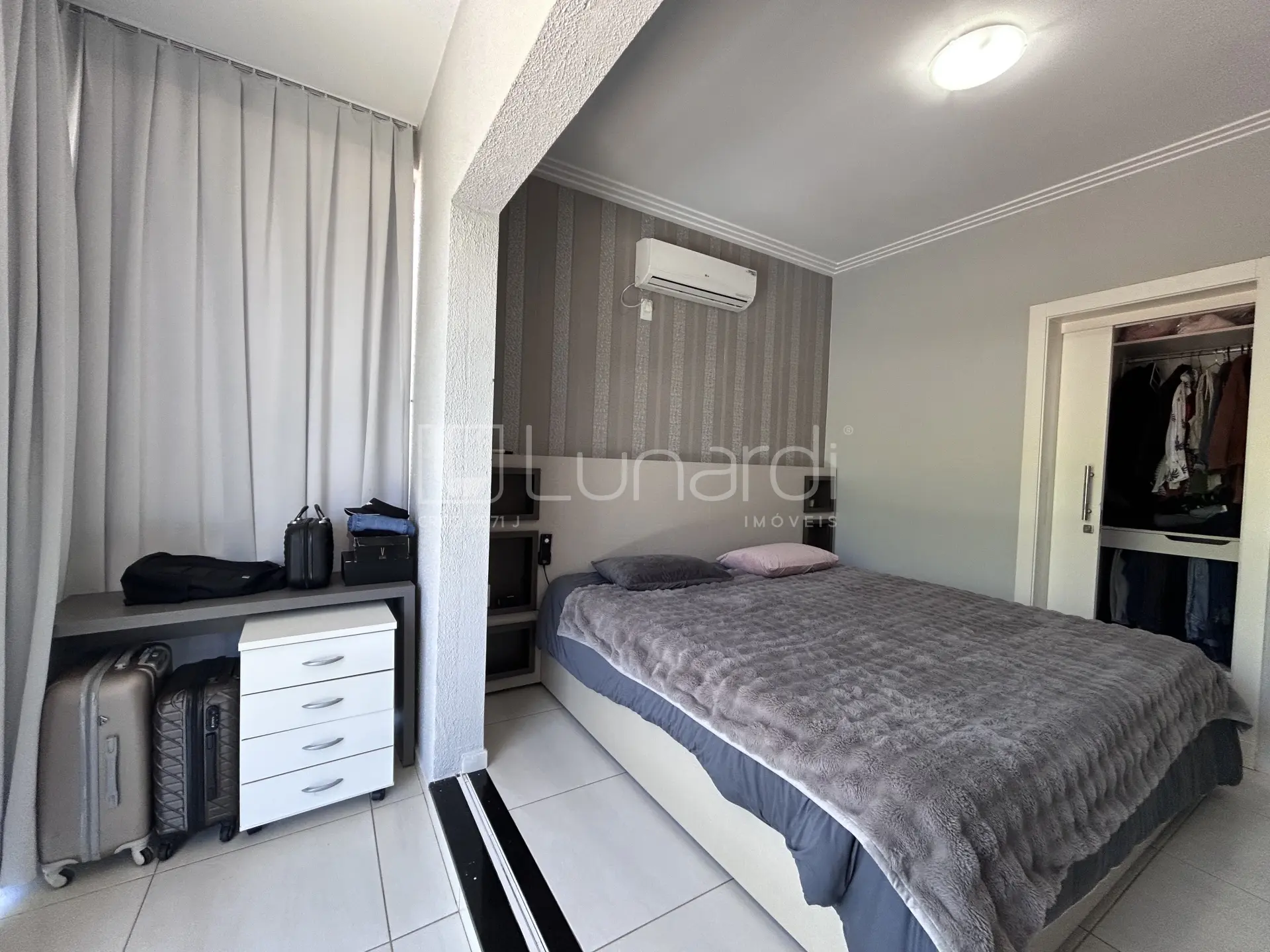 Foto Casa com 3 Dormitórios