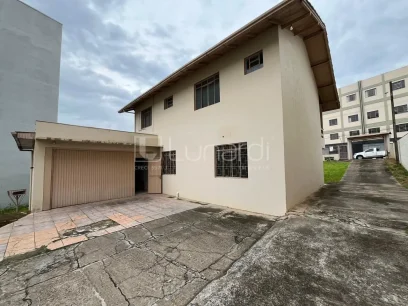 Foto Casa com 5 Dormitórios