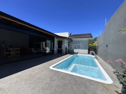 Foto Casa com 3 Dormitórios