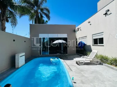 Foto Casa com 3 Dormitórios