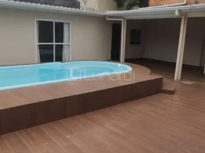 Foto Casa com 4 Dormitórios