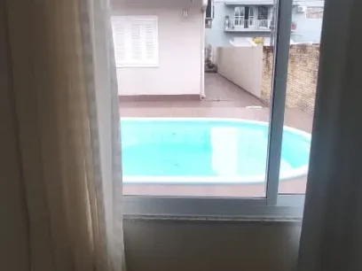 Foto Casa com 4 Dormitórios