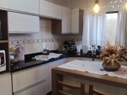 Foto Casa com 3 Dormitórios