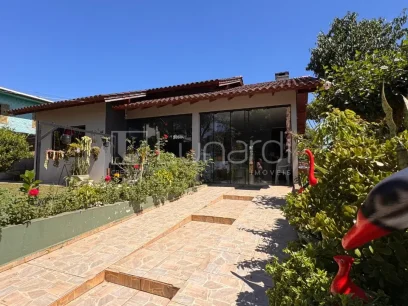 Foto Casa com 3 Dormitórios