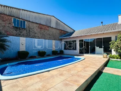 Foto Casa com 3 Dormitórios